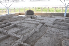 Today, September 18, 2022  we leave by bus to the Uzbekistan-Tajikistan border, Jarteppa border crossing,  where we have to pull our own luggage between the two countries approximately  3/4 a mile over a poorly paved single lane road.  No photos allowed between countries. Once across the border and into Tajikistan we first visit the ancient ruins of Sarazm settlement.  Sarazm was the first city in Central Asia to maintain economic relations with a network of settlements covering a vast territory from the Turkmenistan steppes and the Aral sea. Here we see some of the ruins of the ancient civilization.