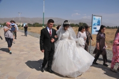 We find a bride and groom having their photos taken at the site.  Just like Uzbekistan marriages in Tajikistan are 95% arranged by the families.