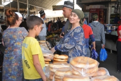 Panjakent market is bustling, even in the late afternoon, with floral-clad women with headscarves, shopping for the days foods and supplies as the enter through the ornate gate into the site.