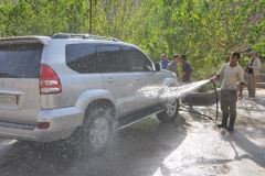 Car Wash by the side of the highway before entering in Dushanbe