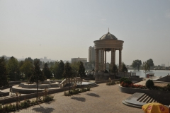 View of the city from the gardens of the Navruz Palace. The facility can be rented for weddings and any type of receptions and meetings. The whole territory of the complex including fountains, summer pavilions and garden – takes more than four hectares. Approximately four thousands of craftsmen from all parts of Tajikistan were involved in the process of building.