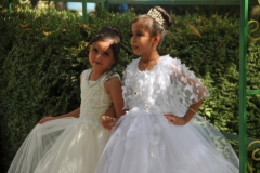 Young girls in the Botanical Park about to have their photos taken.