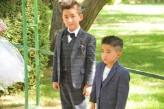 Young boys part of a  party waiting for their photos to be taken in the Botanical Park also.