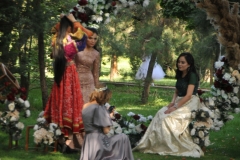 Here we find the ladies from the  garden party earlier with the children enjoying the park.
