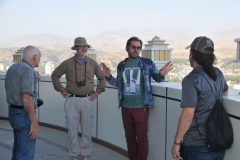 Bozz our guide in Tajikistan  explaining to Bill Oakley, Chuck Coleman and Chris Tripodi our trip leader about what we are looking at across the city.