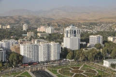 Viewing in the distance surrounding hills, residential buildings located nearby and gardens in the plaza below.
