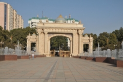Looking at the Arch from years past onto the tree lined street. We saw this Arch from the top of the tower in a earlier photo looking down.