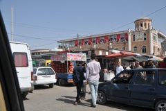 You can find all types of items within this bazaar.  A truck load of onions to the left of the photo in the back of a truck.