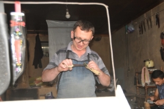 Stopping to see another knife craftsman at work