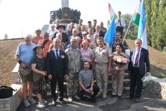 The group honoring their veterans asked who we were and why we were in the park that day. We explained we were tourists from the US and Canada and we had veterans among us from conflicts in the world they asked to join them in photos.