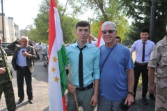 A young flag barer asked if he could have a photo with me, an American. I was honored.