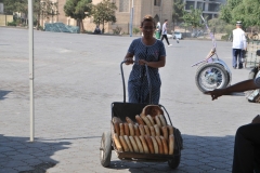 This break has to be only minutes old out of the ovens.  Notice no wrapping protection around any of the breads we have seen.