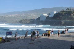 Walking the beach areas. People watching those catching a few waves to surf.