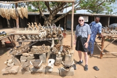 A friend Bill checking out the animals.  Couldn't make up his mind on the one he wanted as a souvenir.