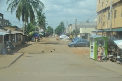 Driving across Lome viewing side streets.   Life in general.