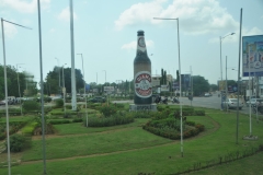 Advertising a local beer on a round about.