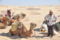 They asked who wanted to be first? I was at that camel  in seconds and climbing up for another adventure.  This was the driver and camel I climbed up on. 