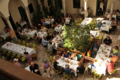 The merchants used to sleep in rooms located on the upper level, while their camels, horses, and mules rested in the inner courtyard on the ground level. The fondouks were not only a place of rest but also a place for stocking up goods for the road and conversing with other traveling merchants.  Many of these have since been converted into hotels for modern-day travelers and tourists. 