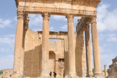 The Capitol is exceptionally well preserved, which is a consequence of its inclusion in the Byzantine fortification. A series of eleven stairs lead up to the front portico. The temple front's Corinthian columns are 26 feet tall, on top of which is the perfectly preserved pediment