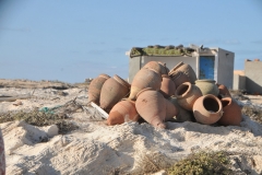 Still another method of baiting pots in the water and catching fish.