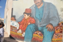 We left the shore line and drove to the small town of Erriadh where on many of the walls of homes artists from a number of areas come to this town, meet with the owners of homes and paint incredible images on the walls. They paintings remain for only two years and the whole process happens over again.  It was awesome.  Enjoy the photos of the paintings. 