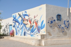 What a great idea. I hope more villages and cities in the world come together to do this same art on neighborhoods in their home towns. People have come from all over to enjoy this art. 