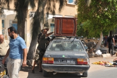 Best way to get it home after the sale... on top of the car roof. 