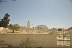 A cemetery at the top of a hill.