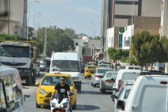 Driving to Chenini we pass through a small town.  The traffic is congested for the traffic light. 