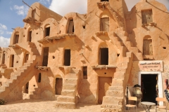 Chenini, the village which was a Granary at one time served as the shooting location of Episode  IV of Start Wars . Barrel-vaulted cells were built side-by-side, one over the other, in honeycomb-like blocks up to 4 to 5 stories high. 