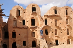  Yours truly standing on the stairs. Originally this was an important staging point on the caravan routes into the interior of Africa, and these organic looking granaries were used as vital warehouses for semi-nomadic families to store their possessions while they were away.