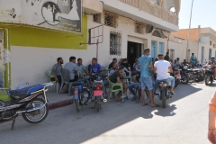 The town of Souk Lahad is located on the road from Kébili, where we tented,  to Tozeur, our next stop tonight, just east of the point where the road begins its spanse of the large salt flats. Lots of men killing time. 