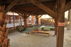 This is the area under the guest house which was lighted at night time with a hammock for rest time. The problem with this lighting was at 1:38 each morning a rooster would show up and start crowing, every 28 seconds,  all through the night, thinking it was day break. This went on all night each night. I went down and tried to catch the rooster several times. Complaining to the desk did not good. If I had caught it it would have been on the dinner table that night. I could not sleep a wink either night thanks to this rooster.  