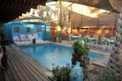 The pool was located next to the bungalow you see in the background. I could look right down into the pool area and restaurant.  