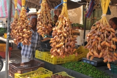 Seeing these dates I wanted to discuss what I found out about salaries in Tunisia and similar in Algeria too.  The 62 year old brick maker making $15 dollars a day is similar to the man we met earlier at the Date Oasis.  He makes the equivalent of $15 a day for picking the whole tree in a day.  He climbs up about 40 trees a day pollinating date trees by hand. He earns 20% of the take on the trees and is a share cropper on the property. He does all the work.   A woman can earn $7 a day if lucky.   There is 40% unemployment in Tunisia.  Remember all the men we saw sitting around in the previous town of Souk Lahad. that was the reason.  No jobs. 