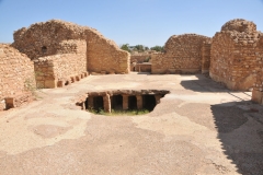 The ruins of the major baths, east of the forum, are notable for their intricate under-floor heating system in the hot chambers, which is plainly visible now that the floors have collapsed partially. 