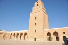 Great Mosque of Kairouan in Kairouan, Tunisia was founded in 670. The minaret dates from the early ninth century, or at least its lower portion does. Perhaps inspired by Roman lighthouses, the massive square Kairouan minaret is about one hundred feet, making it one of the highest structures around. So in addition to functioning as a place to call for prayer, the minaret identifies the mosque’s presence and location in the city while helping to define the city’s religious identity. 