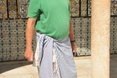 I was wearing shorts and could not show my knees in the mosque. I was dressed in an item to cover up my knees. . 