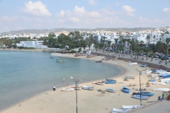 View of the beach areas from view point on top of one of the buildings. 