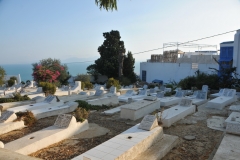 On top of the hill is a cemetery. 