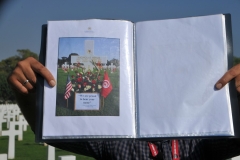 Written information for Nicholas Minue and what he did to have this honor bestowed on him. 