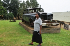 Rusted remains of a Rolls Royce automobile destroyed in battle. Our local guide, Yudaya,  for this Palce and surrounding grounds explains the history to us.