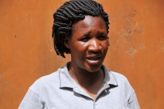 Our local guide, Yudaya,  at the Palace.  During her discussions and at then at this site she told us  the story that her own   father was killed on this very site by Idi Amin and his troops. His body was never recovered.  You could have heard a pin drop everyone was so silent in listening to the story of her families loss here.