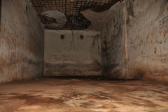 Only meters from the white palace, within the same compound, is a structure originally built by the Israeli government in the 1970s as an armory for the Idi Amin regime. There were five  torture chambers Idi Amin used to kill and electrocute his prisoners.. These are photos of the interior of the death chambers.