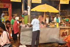 Local fish is being purchased in the hot sunny day