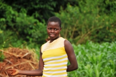 A beautiful young lady pausing for a moment for a photo.