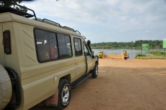 Our vehicles waiting for the ferry to cross the Nile to continue the trip onto Murchison Falls