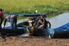Motorcycle and all in the canoe