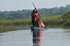 Several of our group ahead of us in a canoe