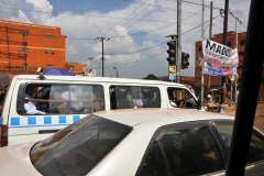 Local transportaion to the outlaying areas. They cram as many as they can into the vans.